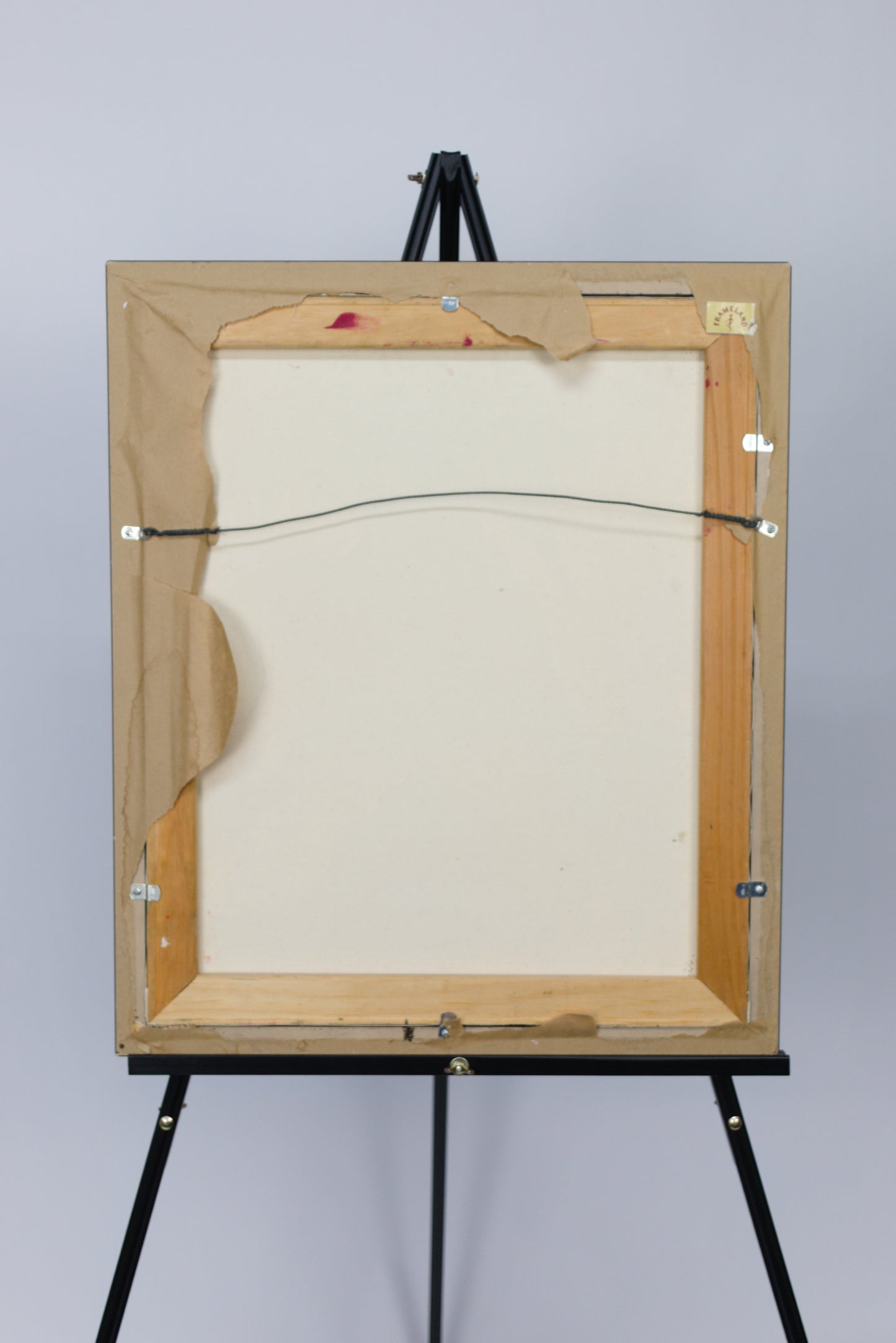 back of framed painting