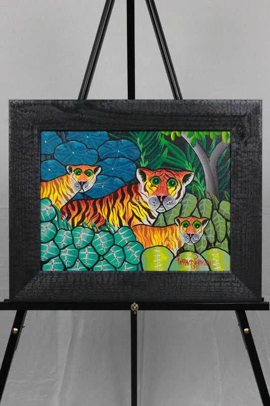 Painting by Francis Paraison of 3 Tigers in a jungle in Haitian Folk style
