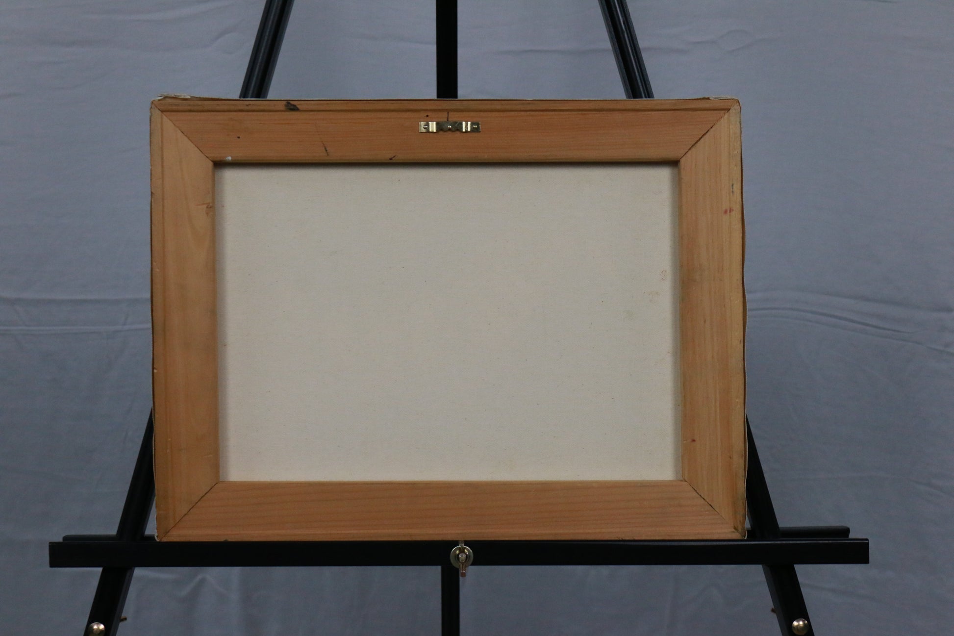 Photo of the back of framed canvas